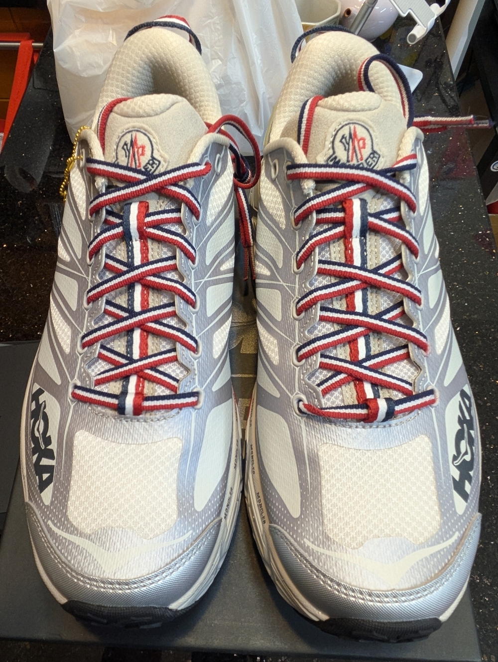 HOKA Neutral Gray Athletic Sneakers with Red & Navy Accents